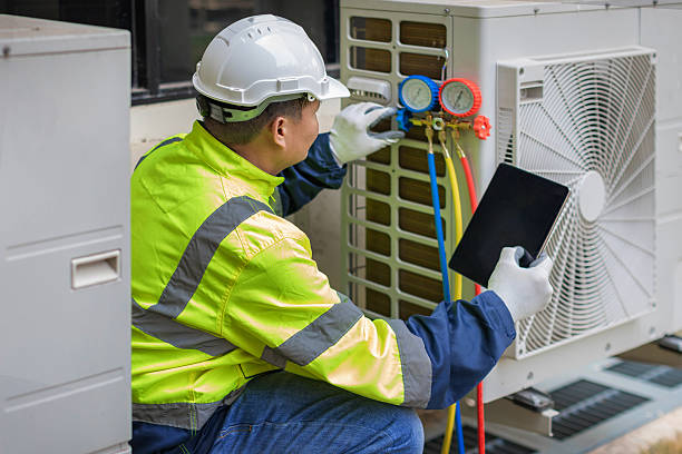Professional Ductwork Repair technician working in Hendersonville, NC